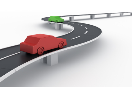 Curved road bridge with cars