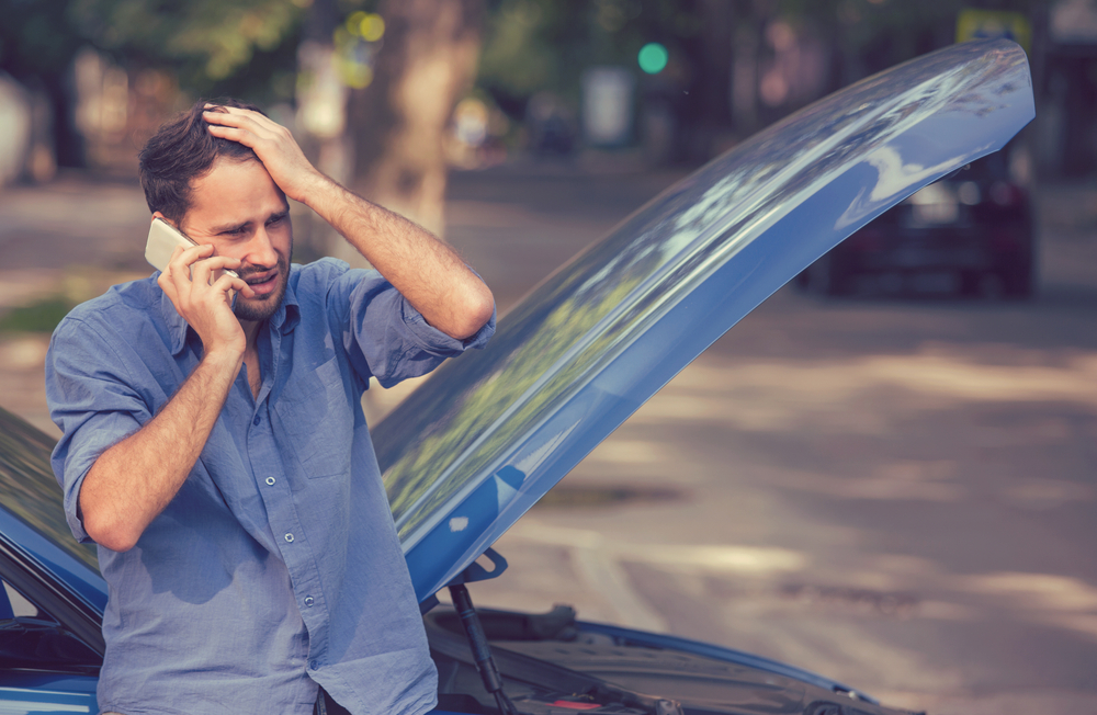 frustrated-man-car-breakdown